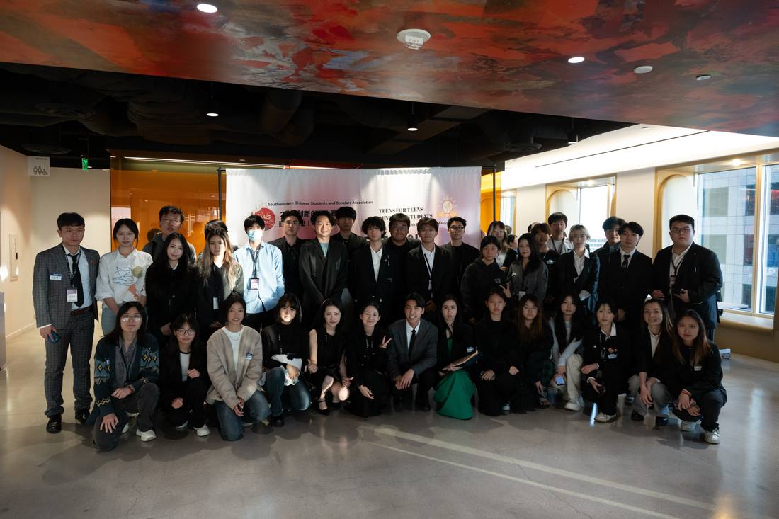 SparkHub organizers and student volunteers posing together after the 2025 pitch competition