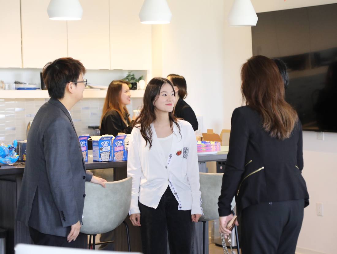 Participants meeting and talking during a SparkHub gathering